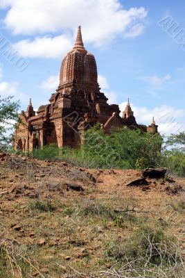 Stupa, hill and cloud