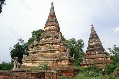Two stupas and lion