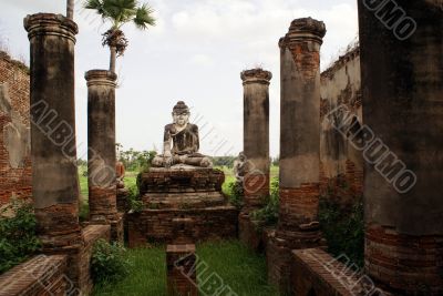 Buddha and ruins