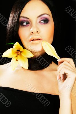 brunette girl posing on dark background