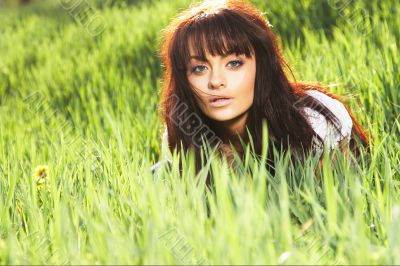 woman rest on the grass