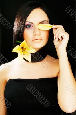 brunette girl posing on dark background