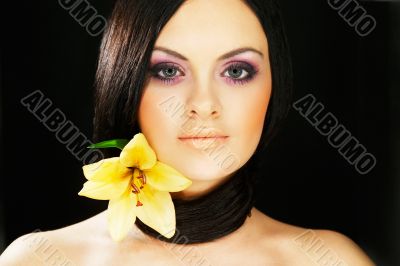 brunette girl posing on dark background