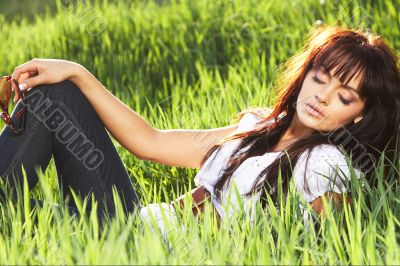 woman rest on the grass