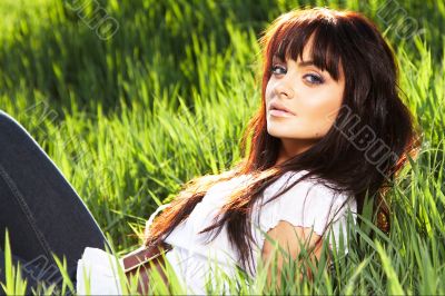 woman rest on the grass