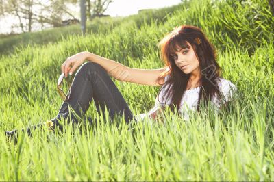 woman rest on the grass