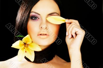 brunette girl posing on dark background