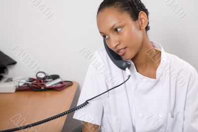 Doctor in her office