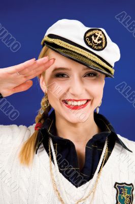 Saluting blond young woman