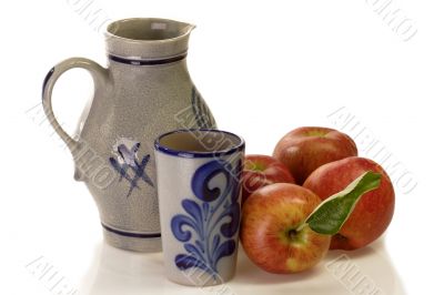 Apples with beaker and jug