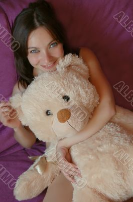 Playing with teddy