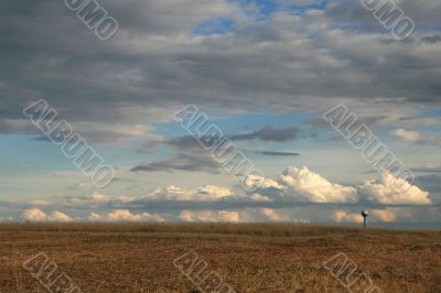Landscape with cloudy sky