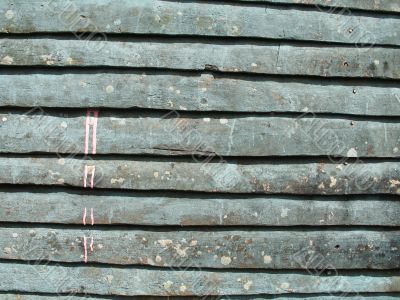 pink leaky paint on a green wall