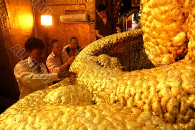 People and Mahamuni Buddha in Mandalay