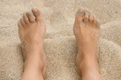 feet in the sand