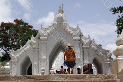 Woman and entrance to pagoda