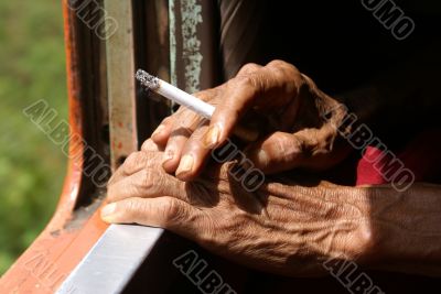 Hand with cigarete