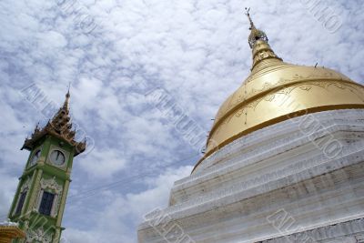 Green tower and golden stupa
