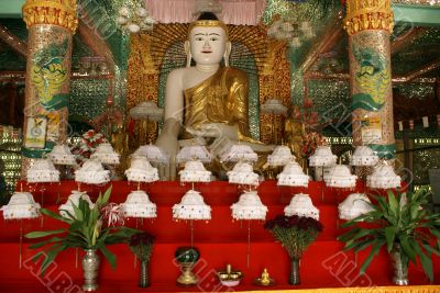 Buddha and umbrellas
