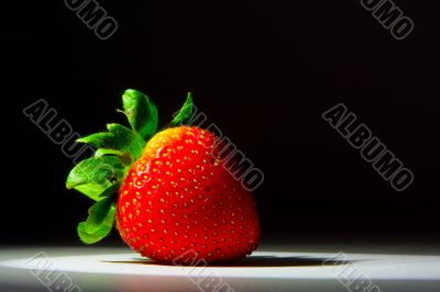 Lucious, ripe, red , juicy strawberry