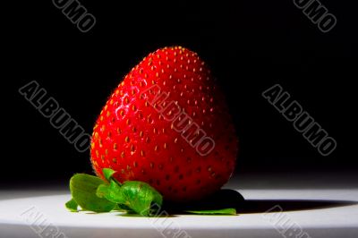 Lucious, ripe, red , juicy strawberry
