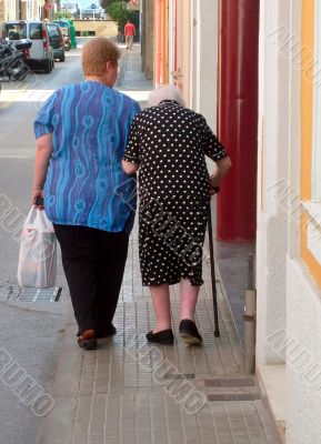 Old woman with stick