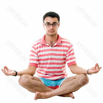 yoga. beautiful man meditates.