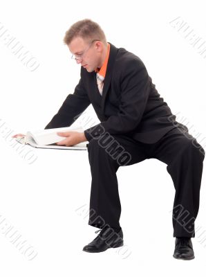 businessman reads the book