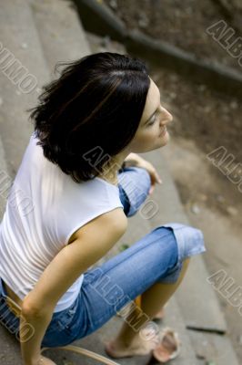 woman sitting on a staircase