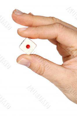 hand holding a dice