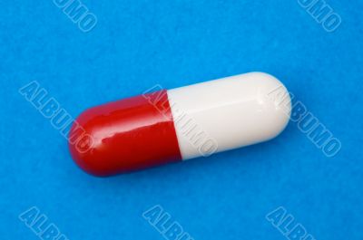 Red and white pill