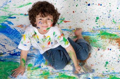 Boy playing with painting