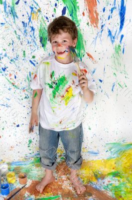 Boy playing with painting