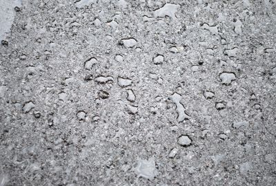 drops of rain water on a fresh asphalt