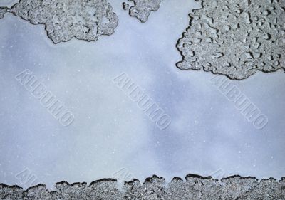 drops of rain water on a fresh asphalt
