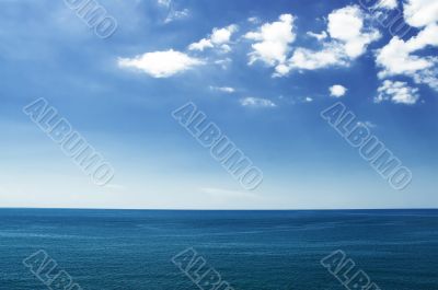 White clouds over the sea