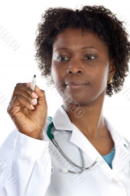 African american woman doctor writing