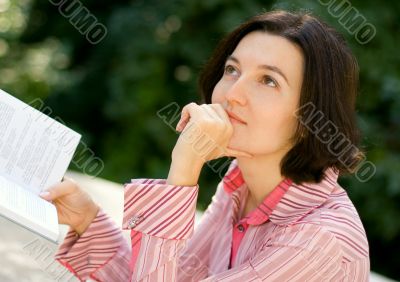 woman reading in park