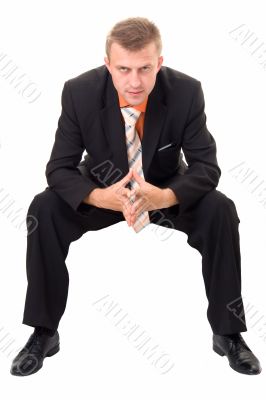 sad businessman sits