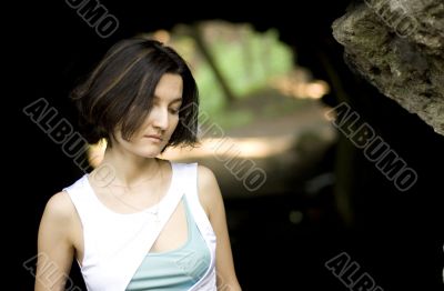 unhappy woman in the cave