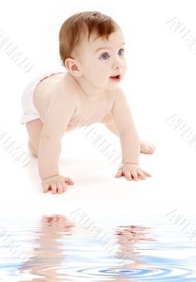 crawling baby boy looking up