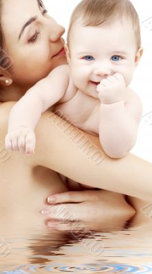 clean happy baby in mother hands