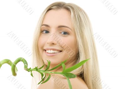 happy blonde with bamboo