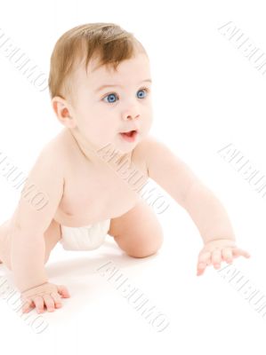 crawling baby boy in diaper