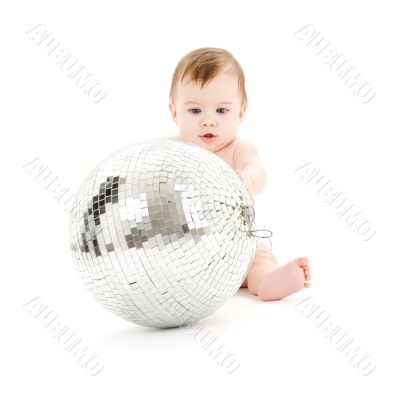 adorable baby boy with big disco ball