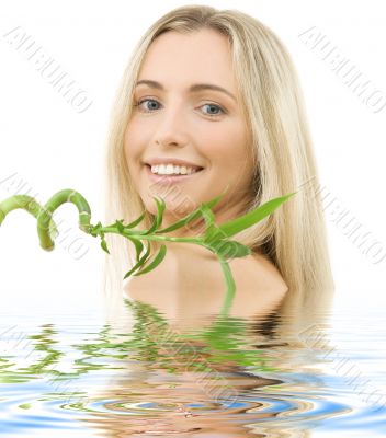 happy blonde with bamboo
