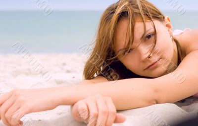woman lying on the beach