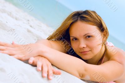 woman lying on the beach