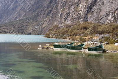 Boats at mountain lake