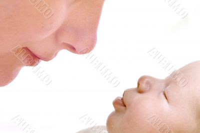 mother kissing her child